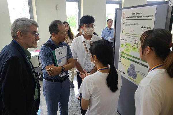 Students present their projects during the poster showcase.