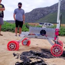 Team RoSE in the field testing their robotic rover for a possible mission to Mars. 