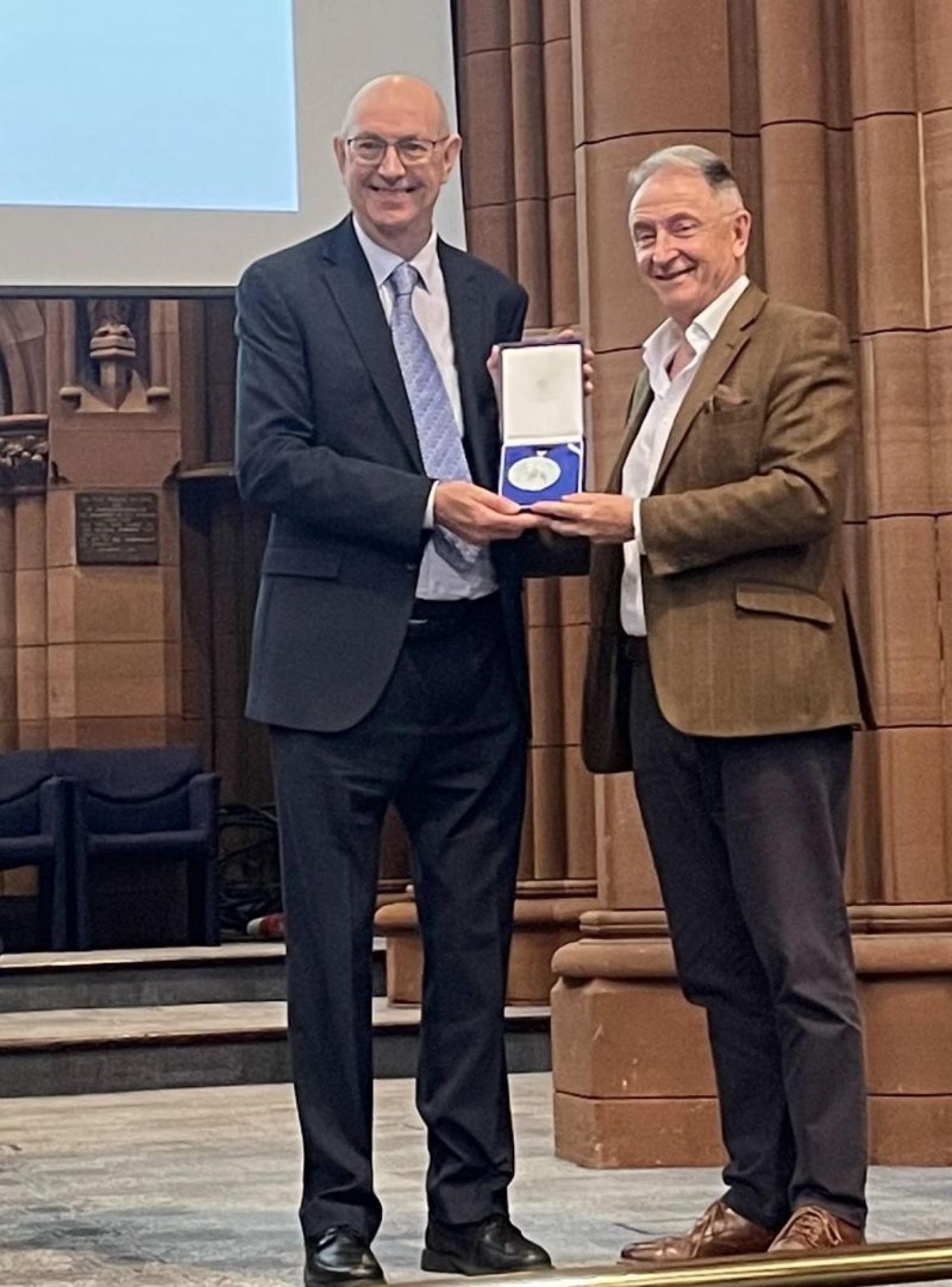 Photo of Professor Marshall accepting Strathclyde Medal